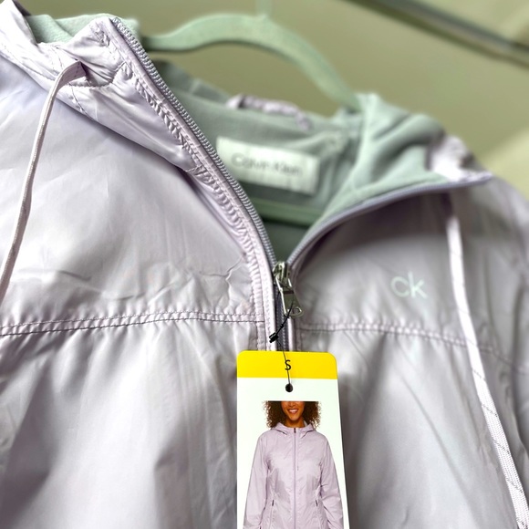 *NWT* Lt weight, lined, hooded CK windbreaker in lilac. Size small. - Picture 4 of 5